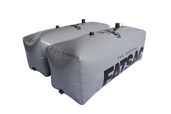 Two gray V-drive Fat Sacs (400 lbs each), ideal for wakesurfing.