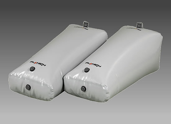 Two Nautique Wedge Fat Sac gray ballast bags with nozzles, ideal for V-Drive boats.