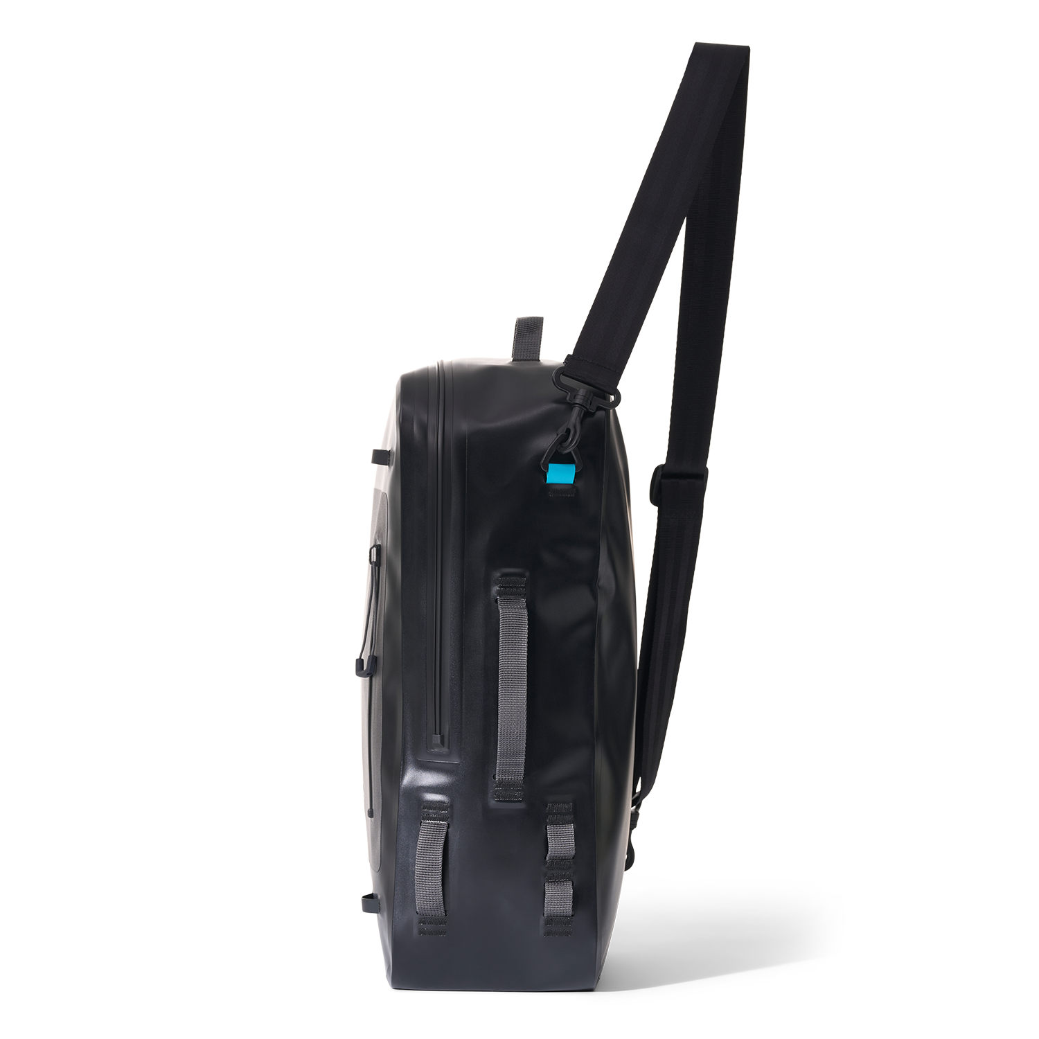 Side view of Day Pack showing slim profile, side straps, and waterproof zipper.