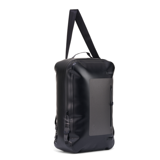 Angled side view of Day Pack highlighting attachment loops and durable black shell.