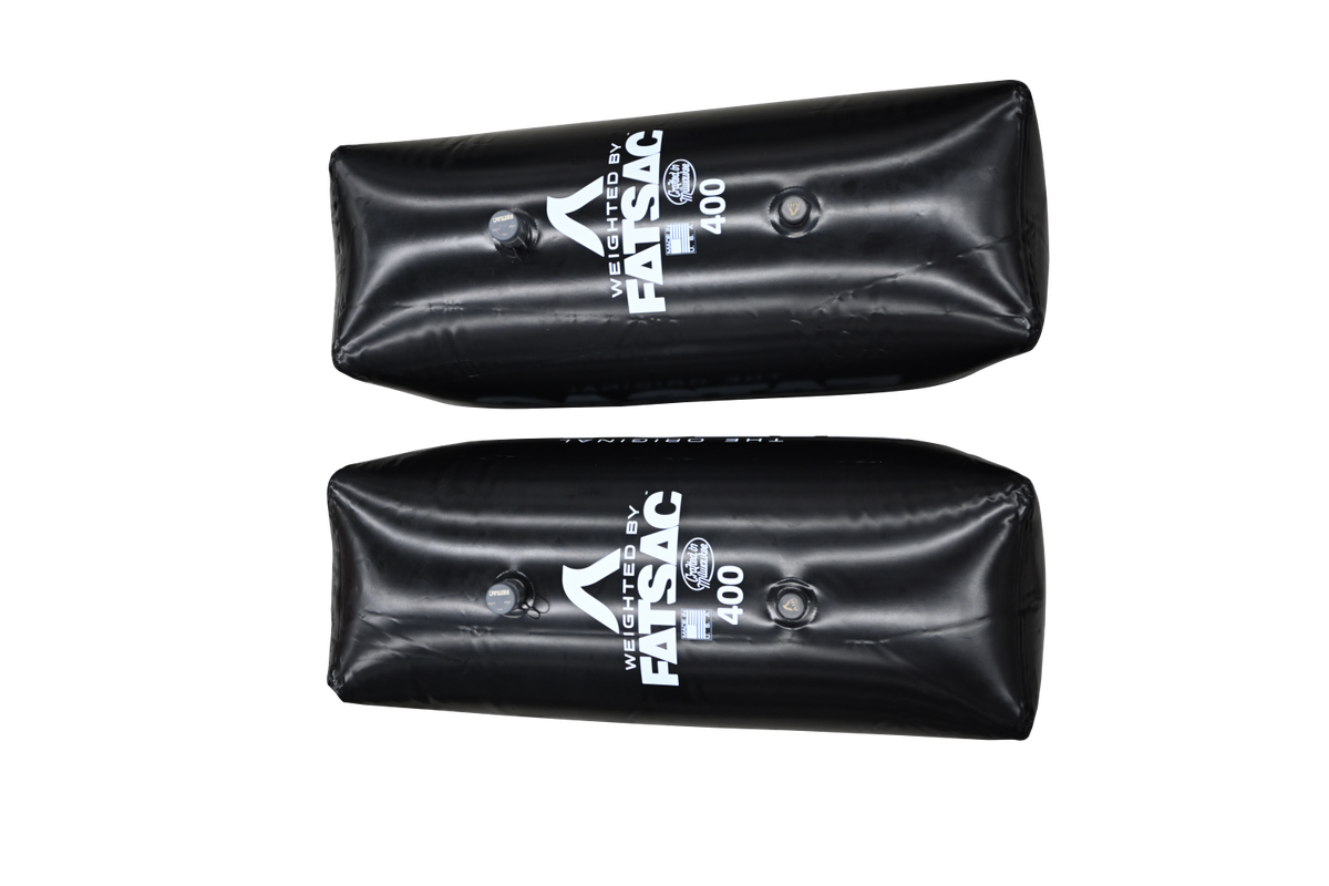 Two black V-drive Fat Sacs, 400 lbs. each, ideal for wakesurfing.