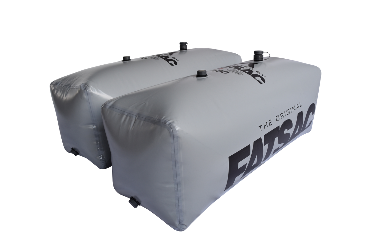 Two gray V-drive Fat Sacs (400 lbs each), ideal for wakesurfing.