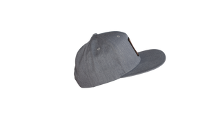 Gray FatSac Snap Back (W966-GRAY) with flat brim and leather patch, side angle.