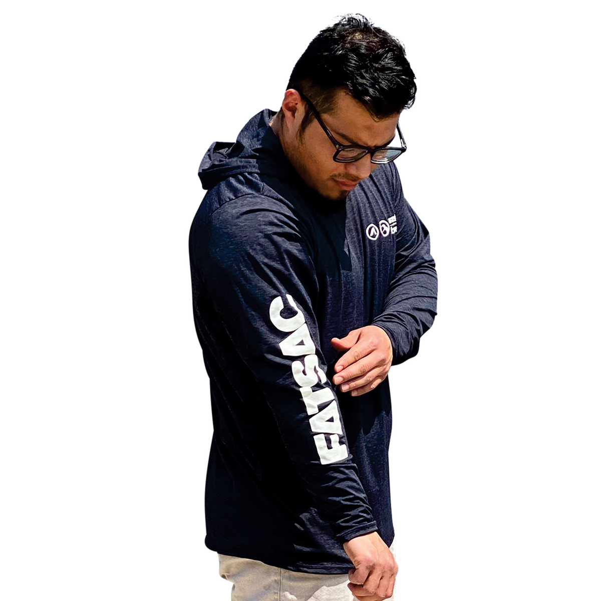 Man in Fatsac Sun Shirt (400-XX), adjusting his sleeve on a white background.